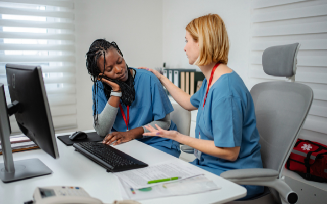 Doctors-sitting-at-desk